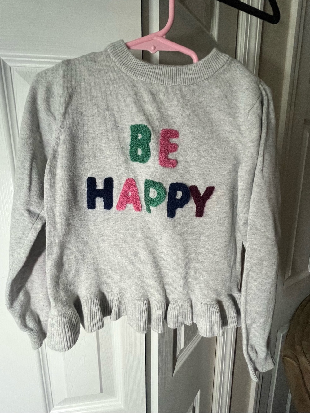 Primark girls Be Happy light gray ruffled sweater size 5/6